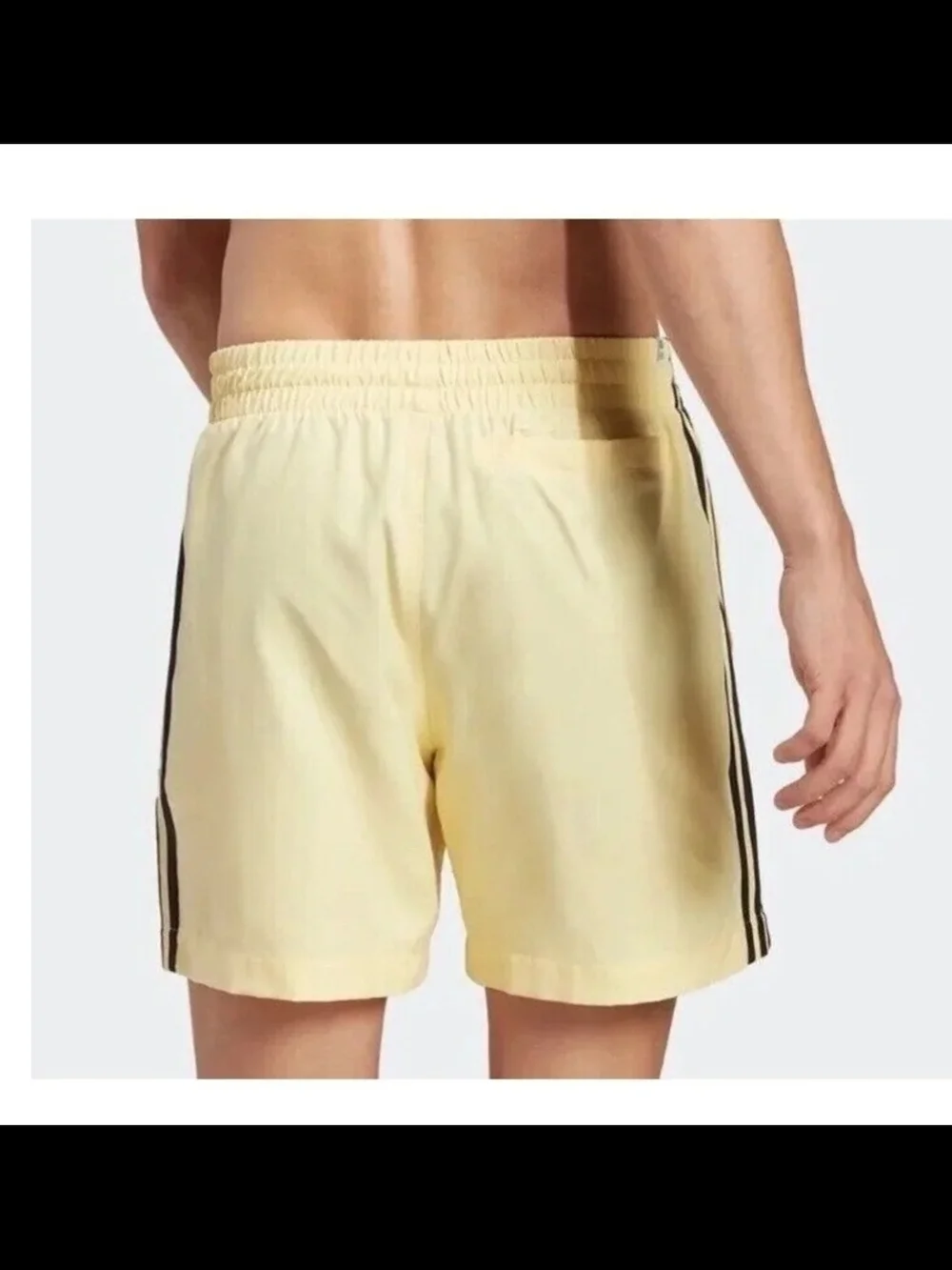 adidas Women’s Pale Yellow 3-Stripes Athletic Shorts
